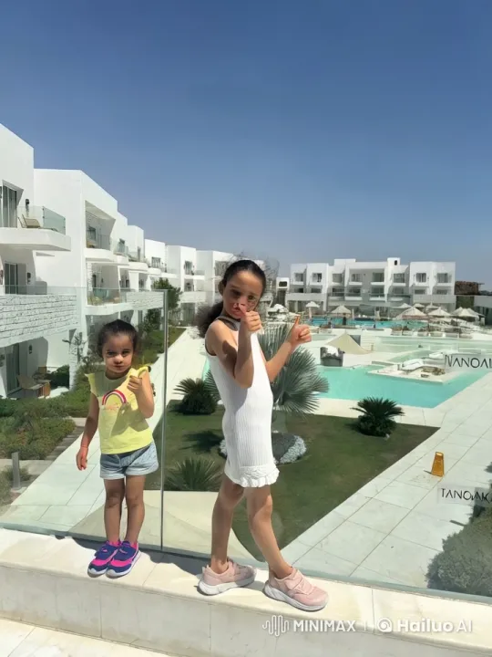 Children's Playful Fight at Resort with Bright Backdrop – AI Generated Video | Hailuo AI