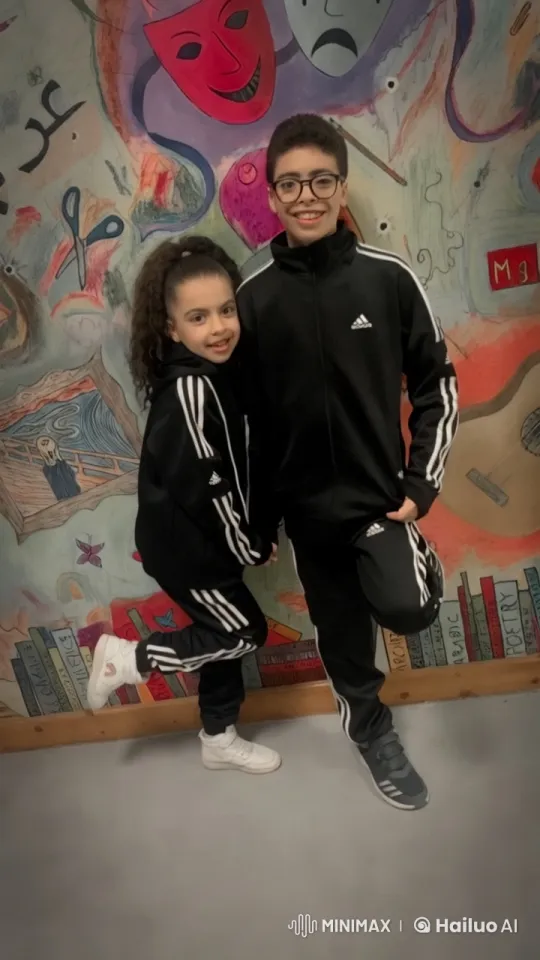 Two in Adidas Suits Face Off in Artistic Mural Setting – AI Generated Video | Hailuo AI