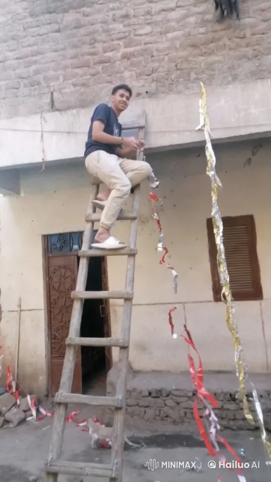 Man Decorates Stone Wall with Streamers – AI Generated Video | Hailuo AI