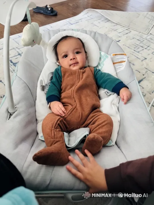 Baby in Cozy Rocker with Gentle Mobile – AI Generated Video | Hailuo AI