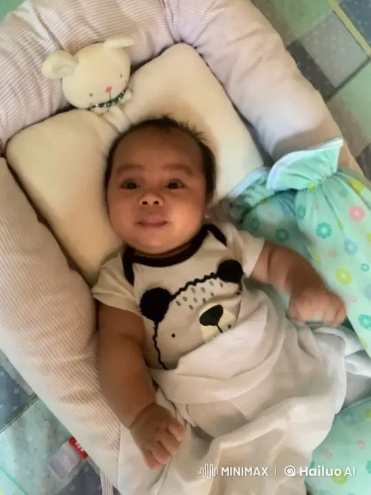Peaceful Moment: Baby in Cozy Crib with Toys – AI Generated Video | Hailuo AI
