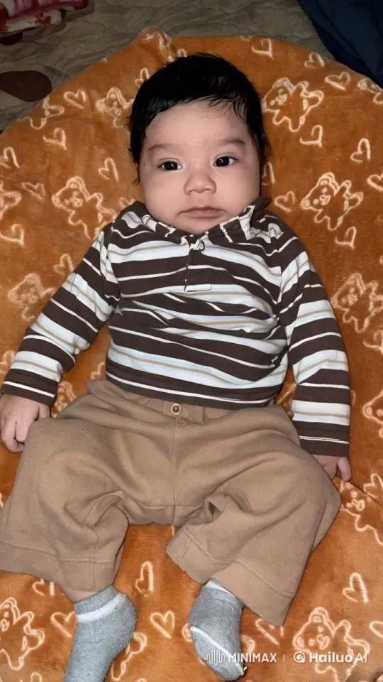 Baby Dancing Playfully on Colorful Blanket – AI Generated Video | Hailuo AI