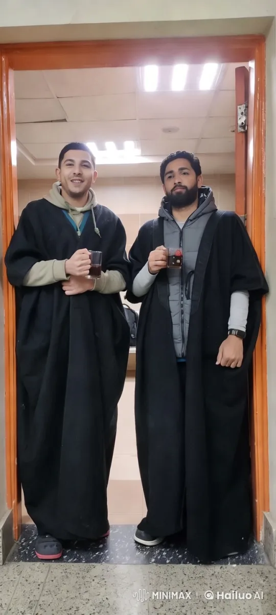 Two Individuals in Robes Engage in Intense Argument and Fight – AI Generated Video | Hailuo AI