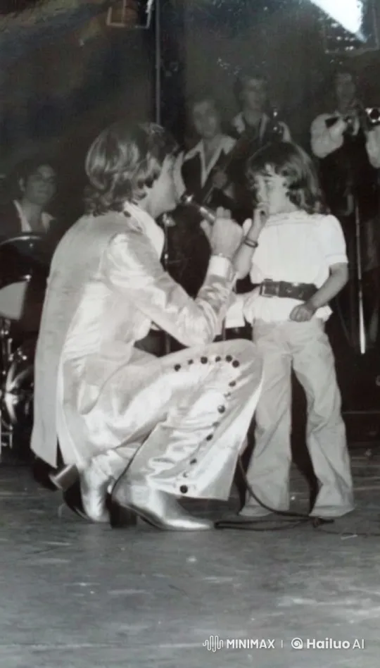 Performer Embraces Young Girl on Stage – AI Generated Video | Hailuo AI