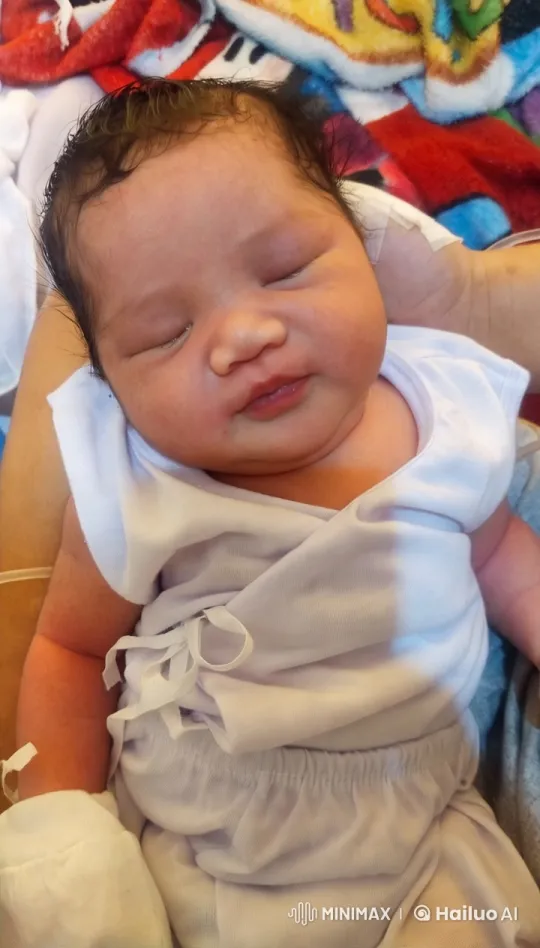 Baby Dancing Playfully on Colorful Blanket – AI Generated Video | Hailuo AI