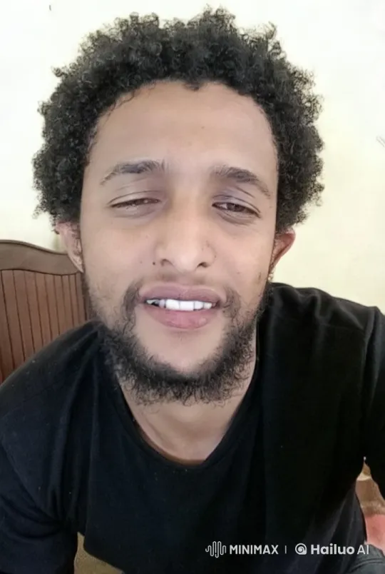 Dynamic Close-up of Curly-Haired Subject in Minimalist Setting – AI Generated Video | Hailuo AI