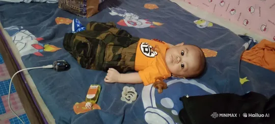Baby Dancing Joyfully on Colorful Bed – AI Generated Video | Hailuo AI