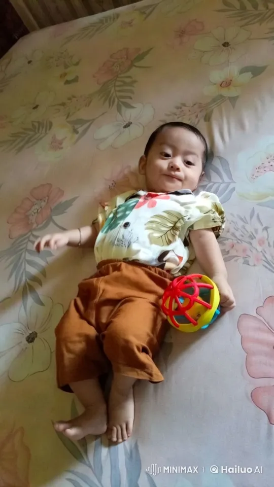 Baby Dancing Joyfully on Floral Bed – AI Generated Video | Hailuo AI
