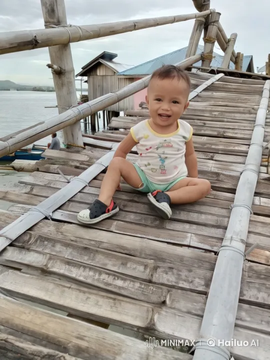 Baby Dancing on Bamboo Bridge with Serene Background – AI Generated Video | Hailuo AI