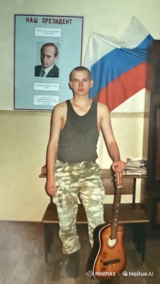 Young Man Plays Guitar in Russian-Themed Room – AI Generated Video | Hailuo AI