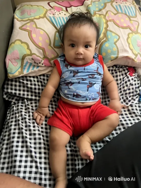 Baby Dancing Joyfully on Colorful Bed – AI Generated Video | Hailuo AI