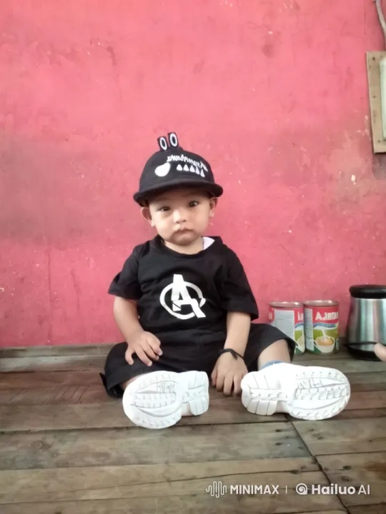 Child Dancing in Avengers Outfit with Colorful Background – AI Generated Video | Hailuo AI