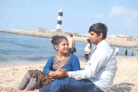 Romantic Couple on Beach with Lighthouse – AI Generated Video | Hailuo AI