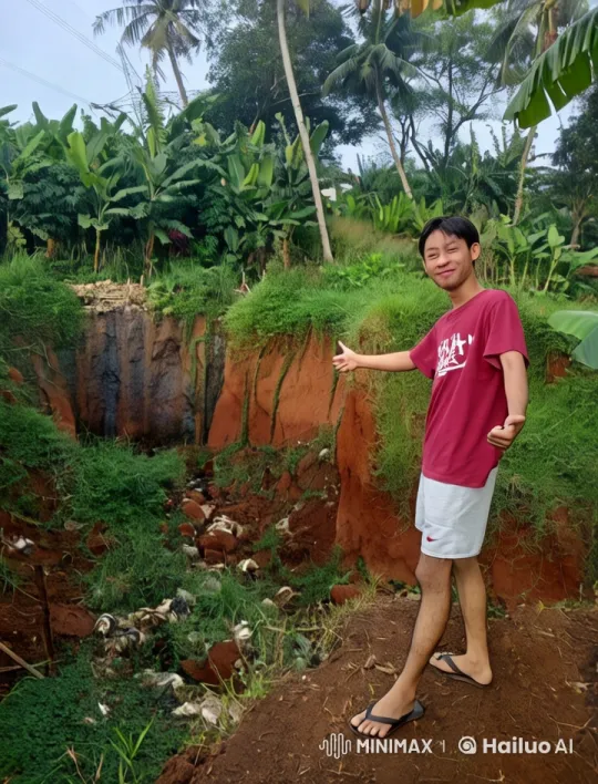 Young Man Highlights Deep Trench Amidst Lush Greenery – AI Generated Video | Hailuo AI