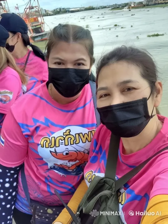 Pink Shirt Group on Bridge Overlooking River – AI Generated Video | Hailuo AI