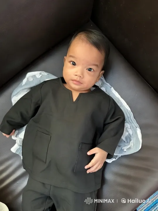 Baby's Playful Kungfu Dance on Leather Couch – AI Generated Video | Hailuo AI