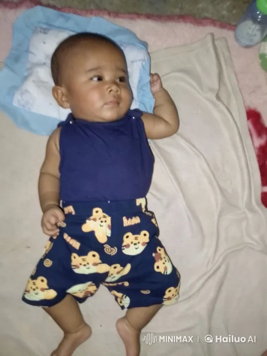 Peaceful Moments: A Baby's Rest on a Cozy Blanket – AI Generated Video | Hailuo AI