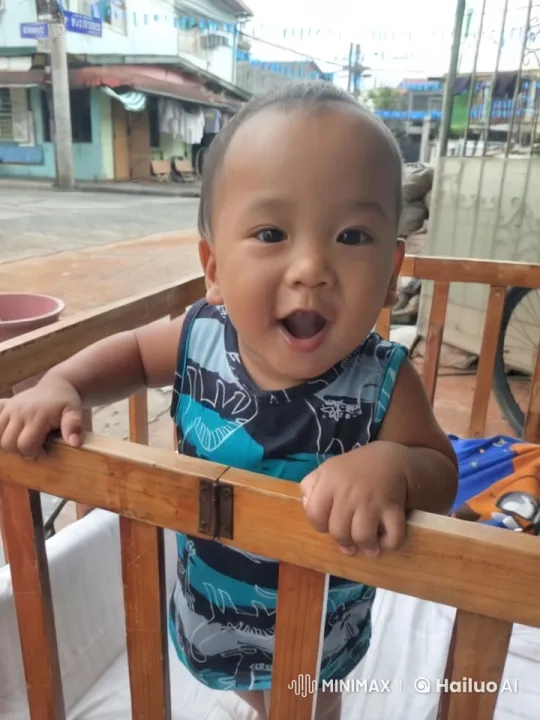 Child Playing in Street-Side Playpen – AI Generated Video | Hailuo AI