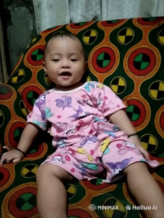 Child Enthusiastically Performs Kungfu Dance on Couch – AI Generated Video | Hailuo AI