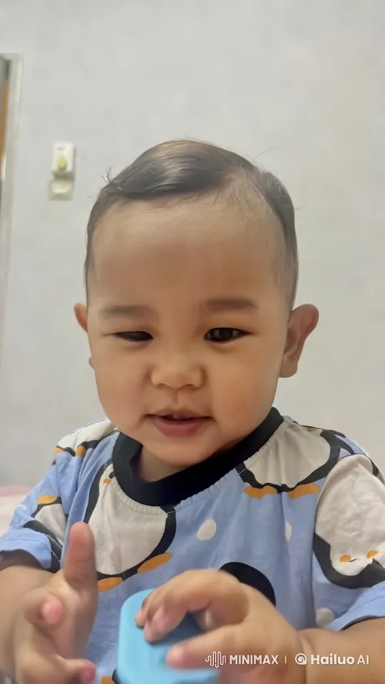Baby Dancing Playfully in Simple, Lit Room – AI Generated Video | Hailuo AI