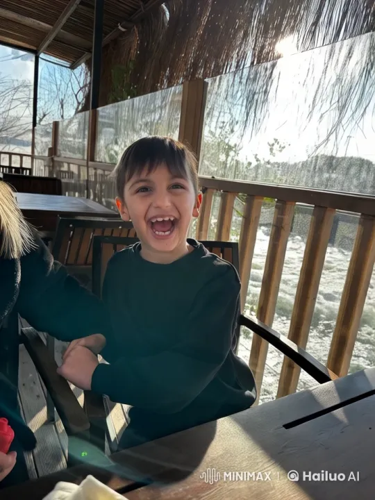 Cozy Outdoor Dining Scene with Child and Adult – AI Generated Video | Hailuo AI