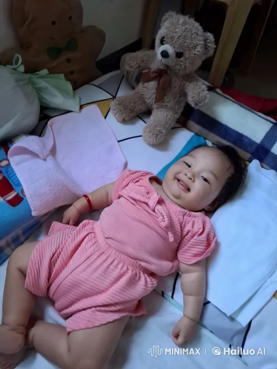 Baby Dancing Joyfully on Cozy Bed with Toys – AI Generated Video | Hailuo AI
