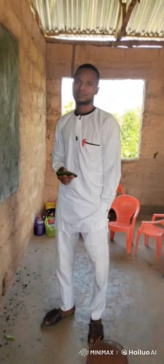Man in White Outfit in Rustic Room Examines Phone – AI Generated Video | Hailuo AI