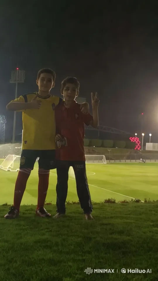 Boys' Playful Fight and Joyful Dance on a Night Field – AI Generated Video | Hailuo AI