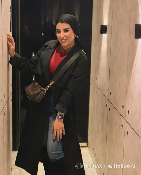 Woman in Dark Outfit Against Light Hallway Walls – AI Generated Video | Hailuo AI