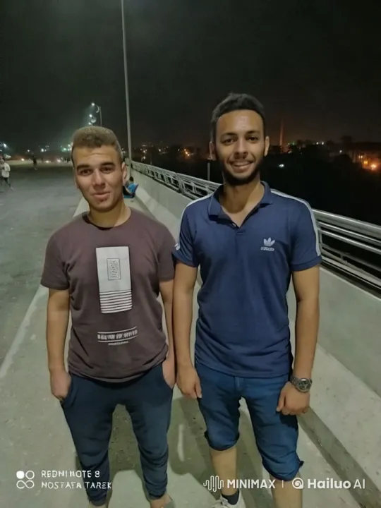 Nighttime Bridge Fight with Cityscape Background – AI Generated Video | Hailuo AI