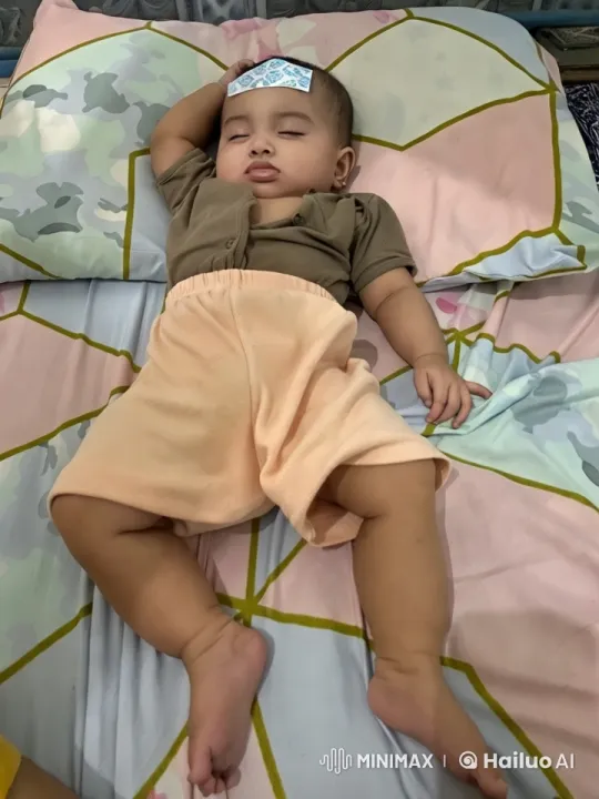 Baby Practices Playful Kungfu in Colorful Bed Setting – AI Generated Video | Hailuo AI