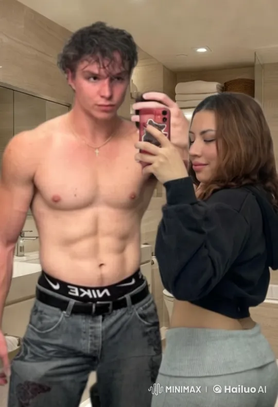 Affectionate Moment in Modern Bathroom Setting – AI Generated Video | Hailuo AI