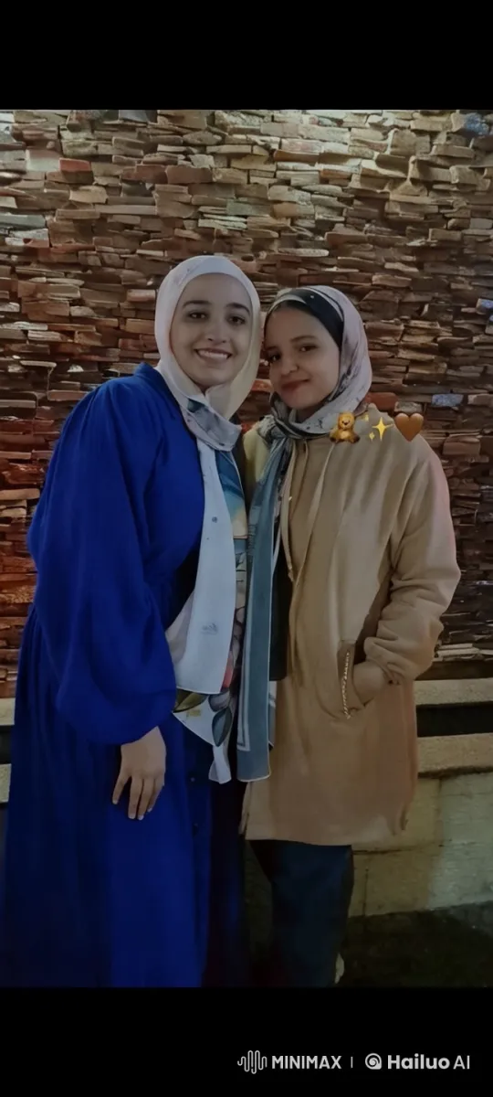 Two Individuals in Coats and Scarves on Brick Wall – AI Generated Video | Hailuo AI