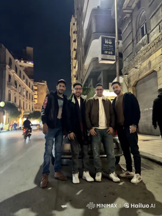 Night Urban Scene: Men by Car Amid City Life – AI Generated Video | Hailuo AI