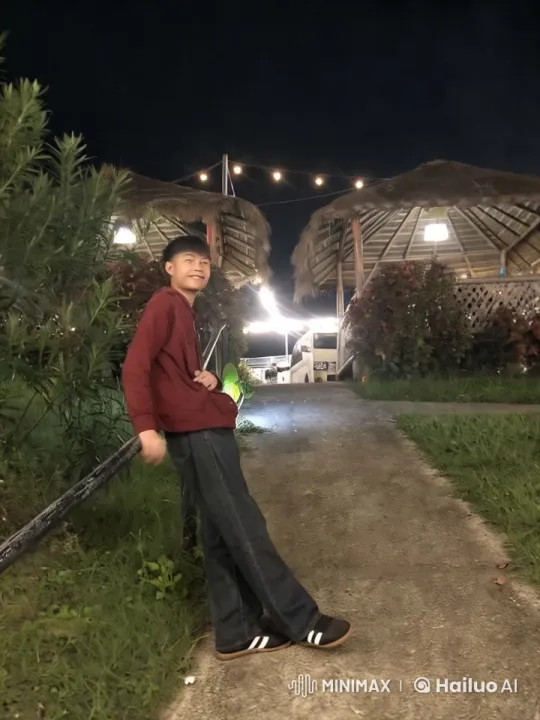 Young Man Dancing in Lush Night Setting – AI Generated Video | Hailuo AI