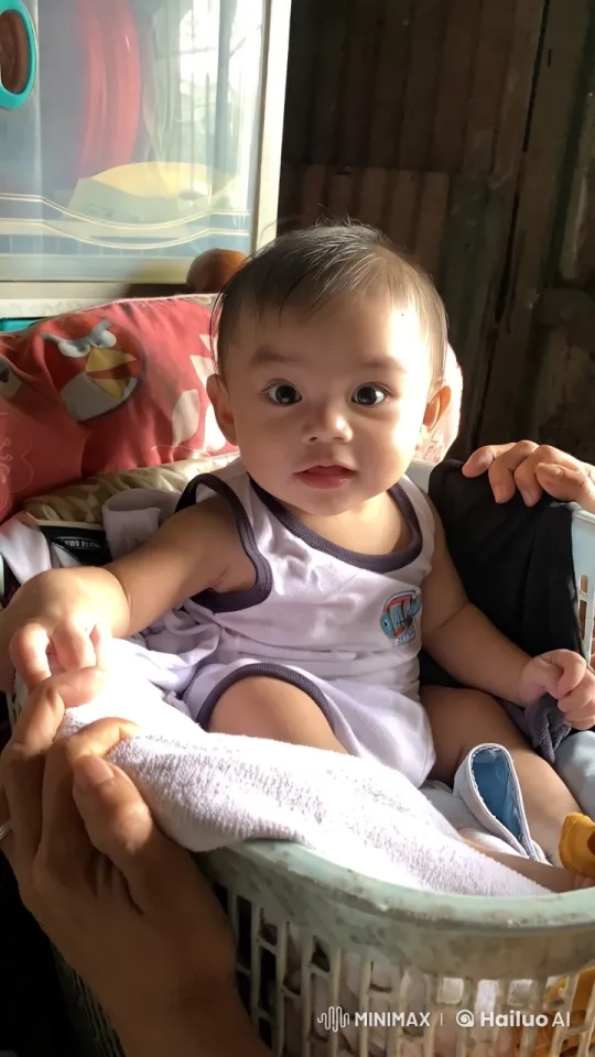 Baby's Joyful Dance and Play in Cozy Laundry Basket – AI Generated Video | Hailuo AI