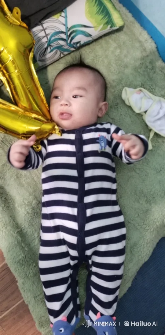 Baby's Playful Kung Fu Dance on Green Blanket – AI Generated Video | Hailuo AI