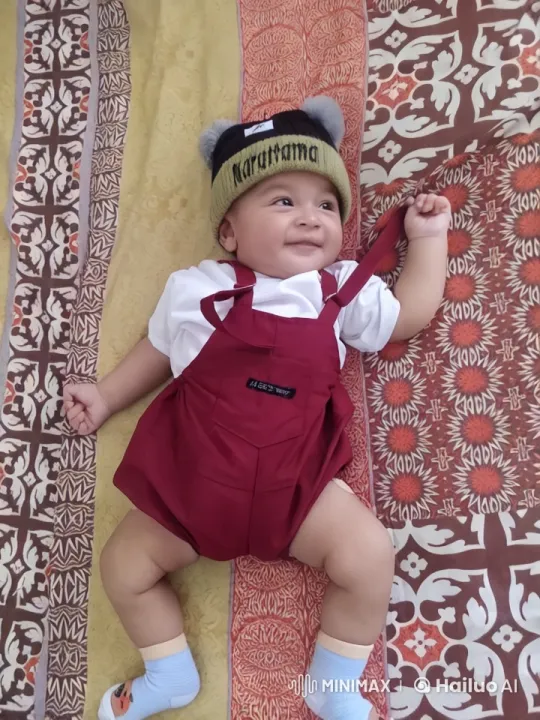 Baby's Playful Kungfu Dance on Patterned Bedspread – AI Generated Video | Hailuo AI