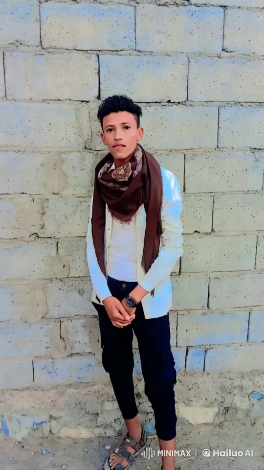 Young Man in Casual Attire by a Concrete Wall – AI Generated Video | Hailuo AI