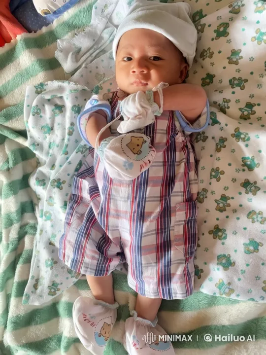Baby Dancing and Playfully Punching on Cozy Blanket – AI Generated Video | Hailuo AI