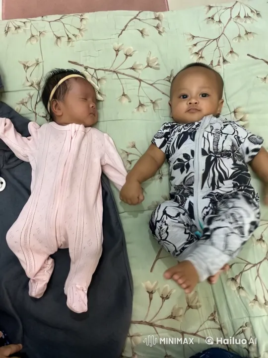Toddlers Dancing and Playing on Floral Blanket – AI Generated Video | Hailuo AI