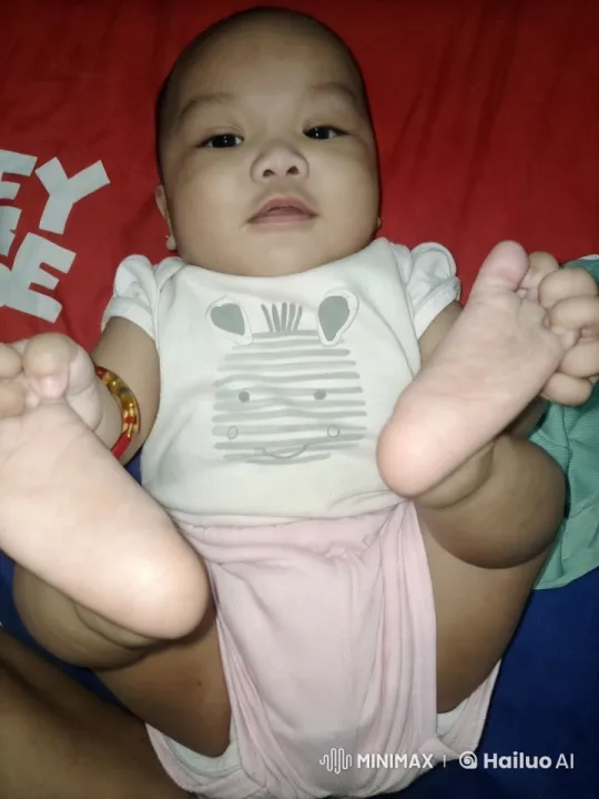 Baby Dancing Playfully on Colorful Blanket – AI Generated Video | Hailuo AI