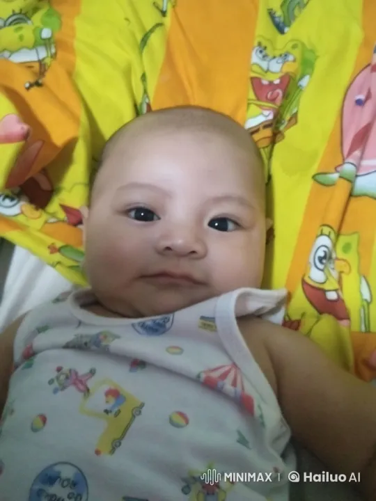 Baby Dances with Playful Energy on Cartoon Blanket – AI Generated Video | Hailuo AI