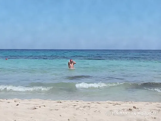 Serene Beach Day: Playful Man and Ocean's Splendor – AI Generated Video | Hailuo AI