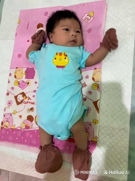 Baby's Playful Kungfu Moves on Colorful Blanket – AI Generated Video | Hailuo AI