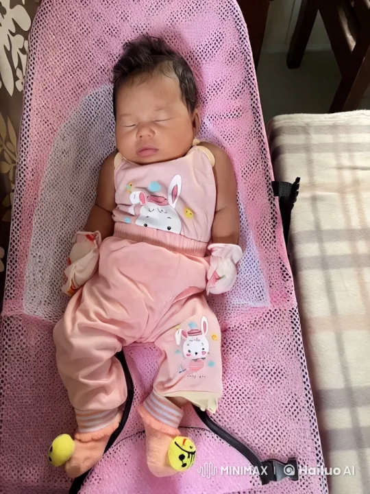 Baby in Pink Outfit in Cozy Mesh Chair – AI Generated Video | Hailuo AI