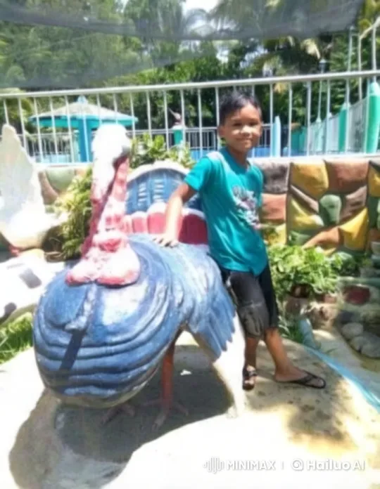 Boy Dancing Energetically by Colorful Bird Statue – AI Generated Video | Hailuo AI
