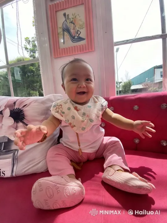 Child's Playful Kungfu Dance on Pink Sofa – AI Generated Video | Hailuo AI