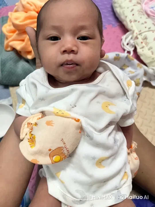Baby Dancing Joyfully on Colorful Mat – AI Generated Video | Hailuo AI