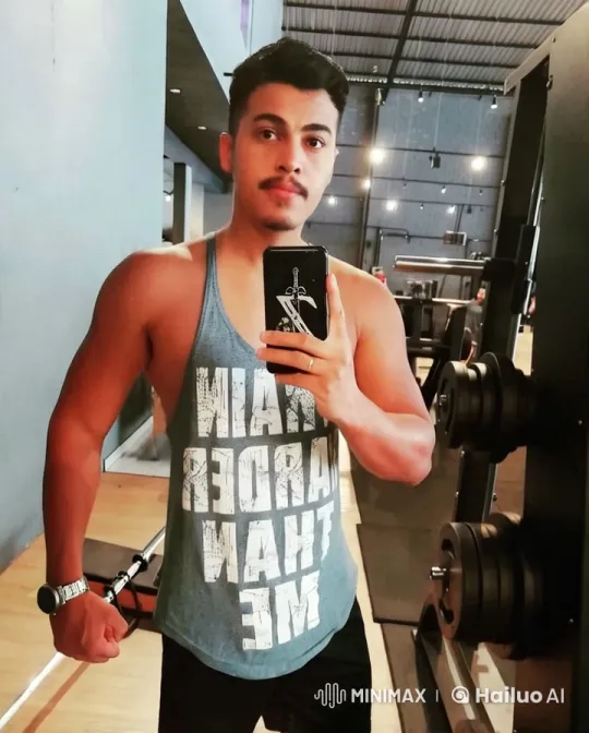 Muscular Man Showcases Strength in Modern Gym – AI Generated Video | Hailuo AI
